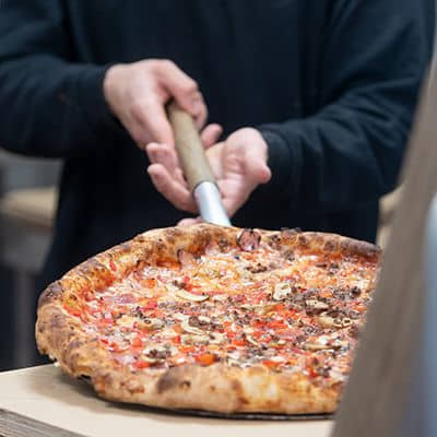 crecimiento de pizzeria Carlos